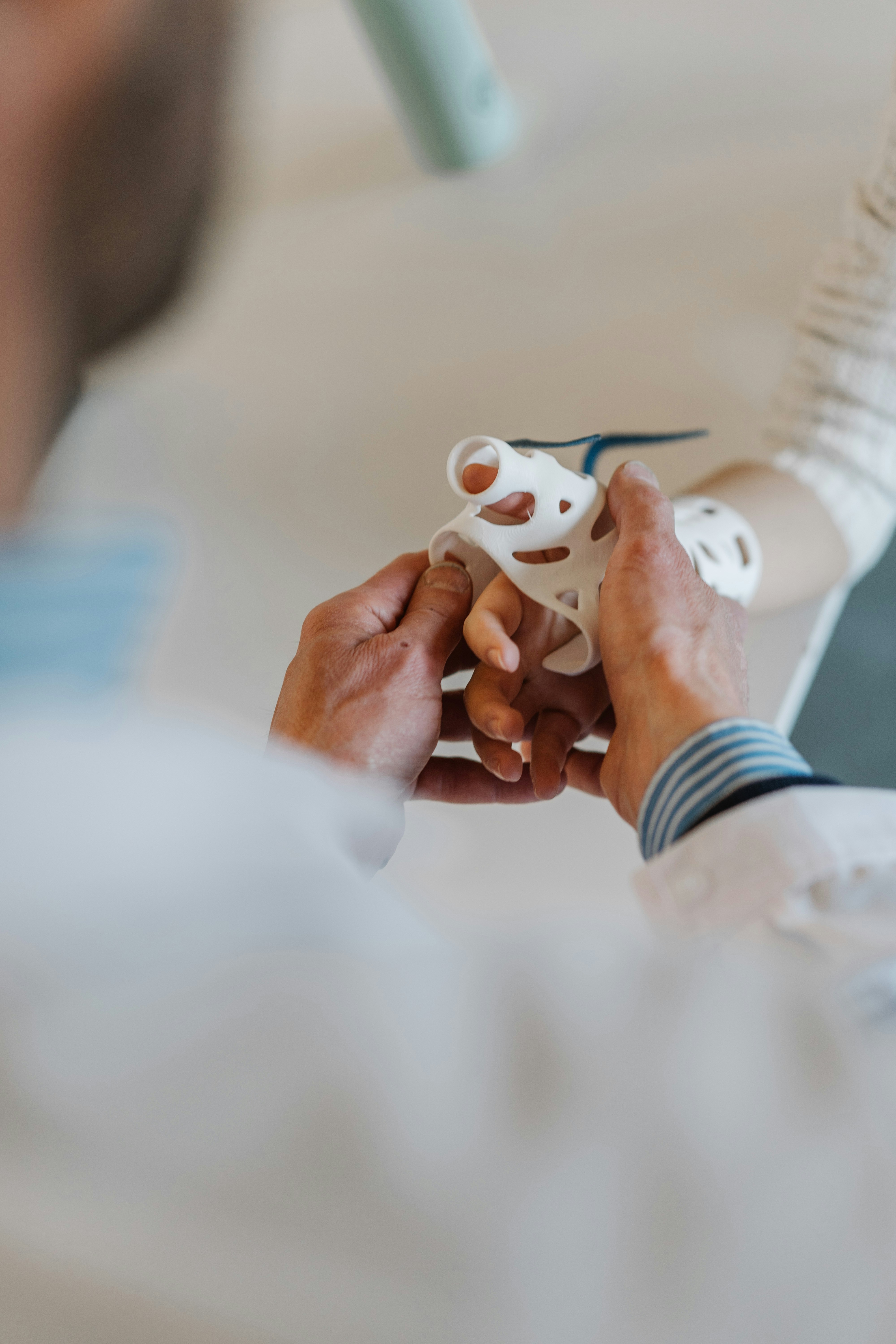 Orthopedic specialist assessing knee joint
